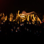 girl in red crowdsurfing